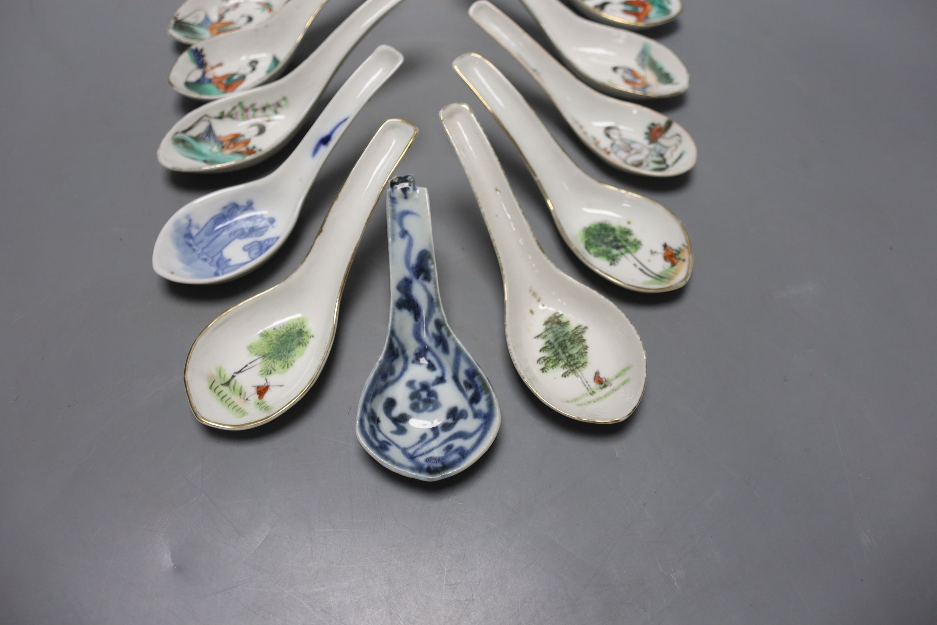 Eleven Chinese porcelain rice spoons, largest 15 cms long.